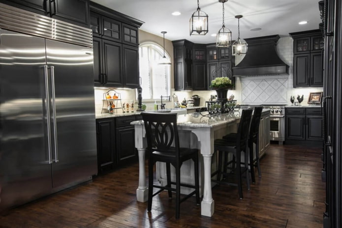 Dark kitchen with chrome appliances