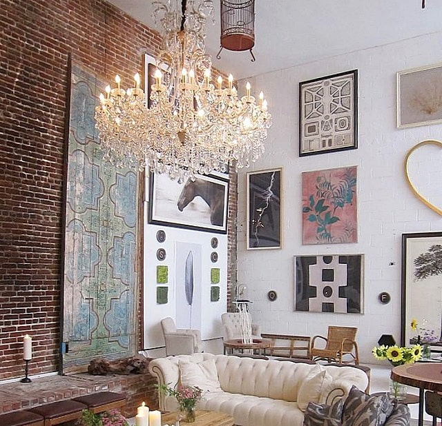 Crystal chandelier in a loft-style interior Crystal chandelier in a loft-style interior