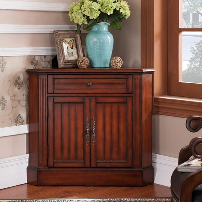Corner chest of drawers made of wood