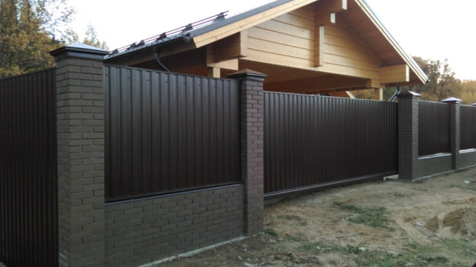 Black fence made of profiled sheet Black fence made of profiled sheet