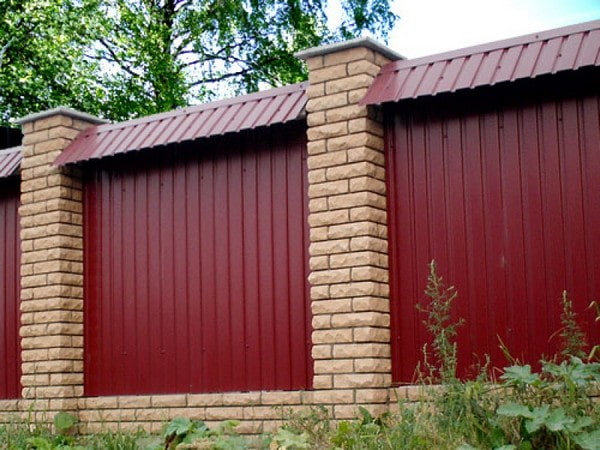 Burgundy corrugated fence with a ridge Burgundy corrugated fence with a ridge