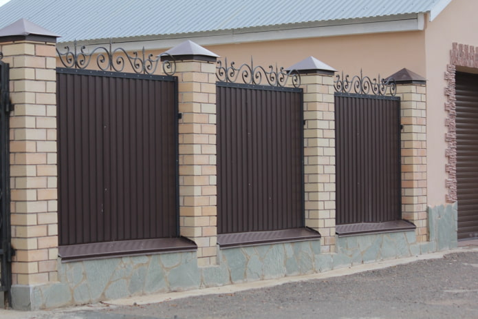 Fence made of profiled sheet with forging and brick Fence made of profiled sheet with forging and brick