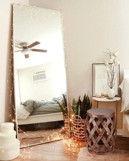 Mirror with garlands