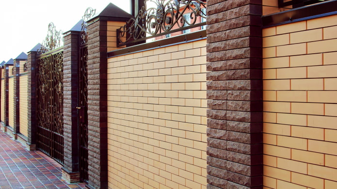 brick and metal fence