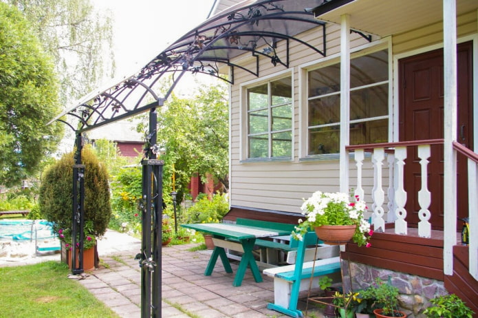 Canopy adjacent to the house Canopy adjacent to the house