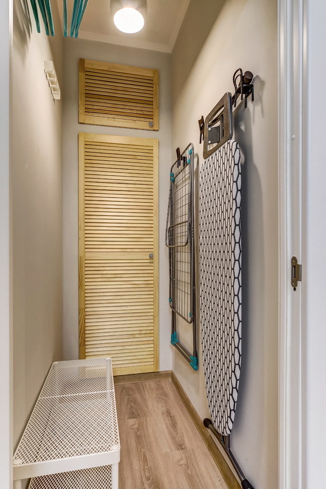 Ironing board on the wall