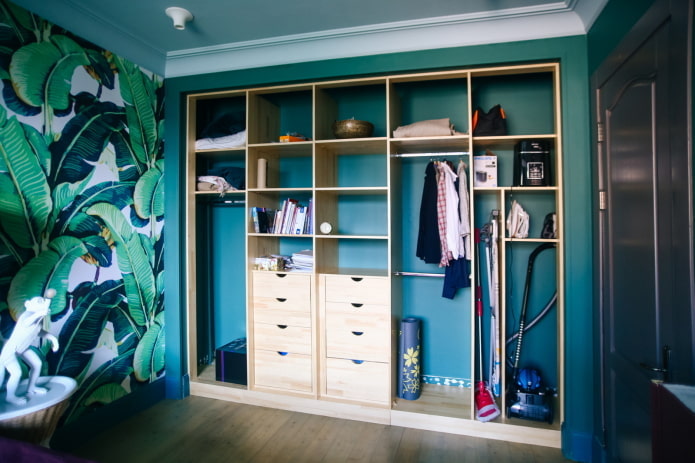 Ironing board in cabinet compartment
