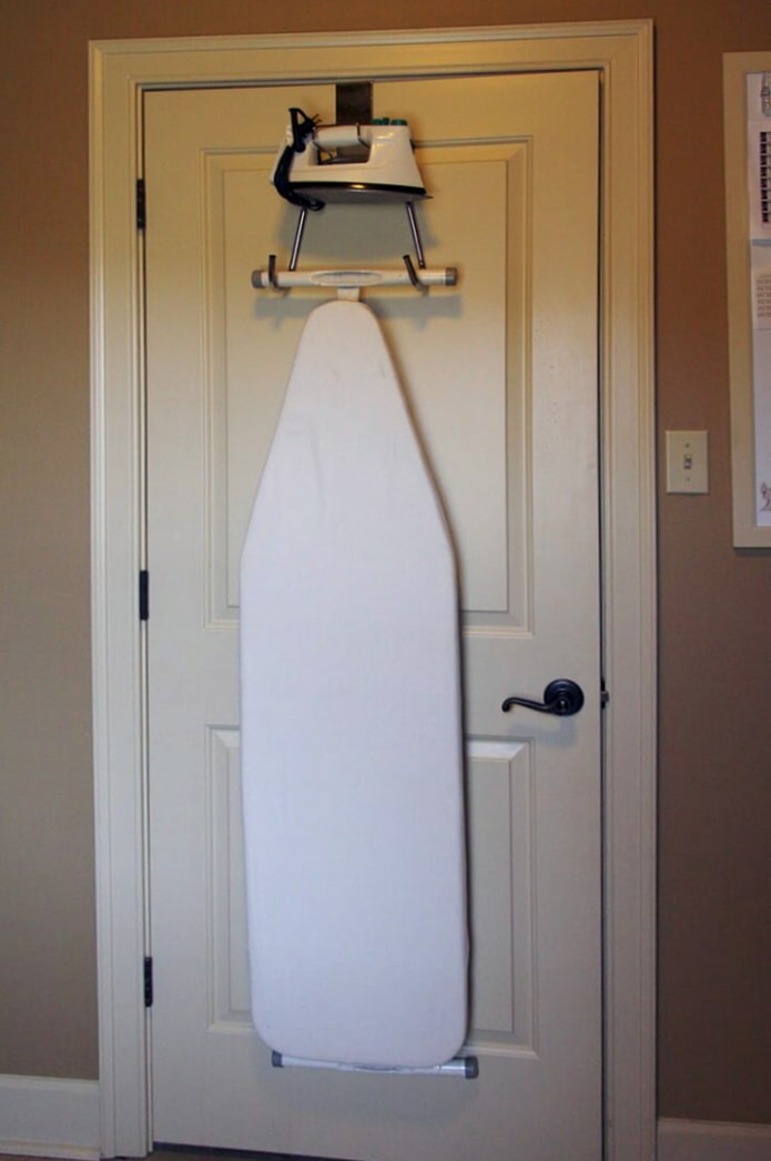 Board and iron attached to the door