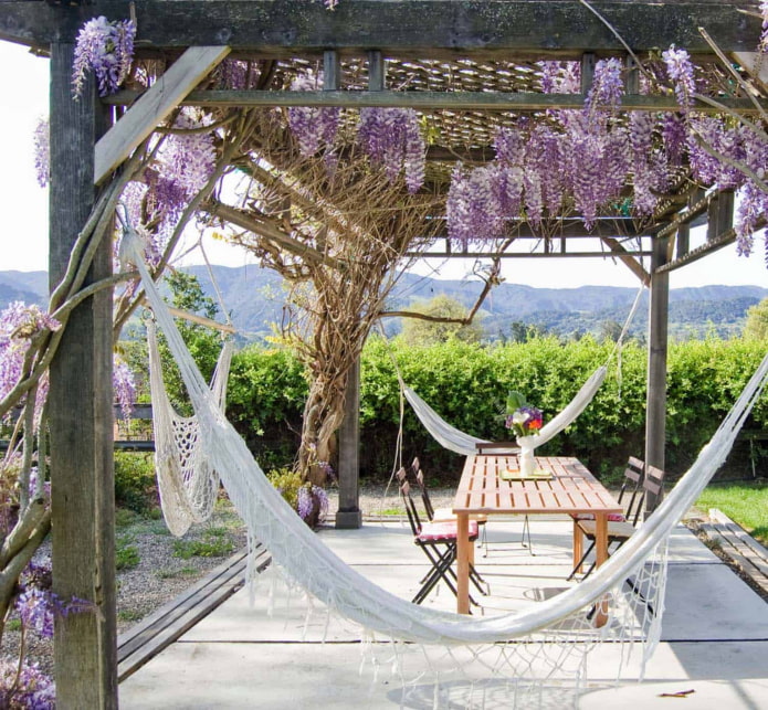 3 hammocks around the pergola