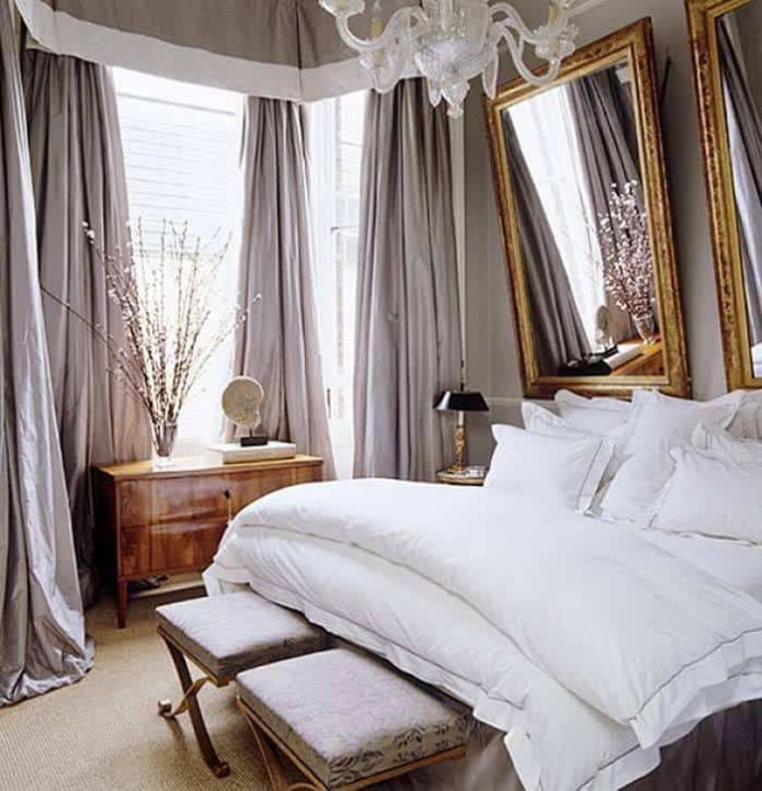 Carved mirrors above the bed Carved mirrors above the bed