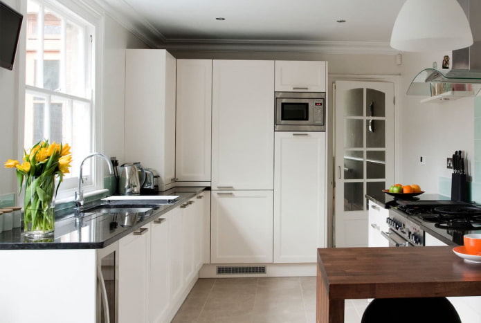 spacious kitchen in a square room spacious kitchen in a square room
