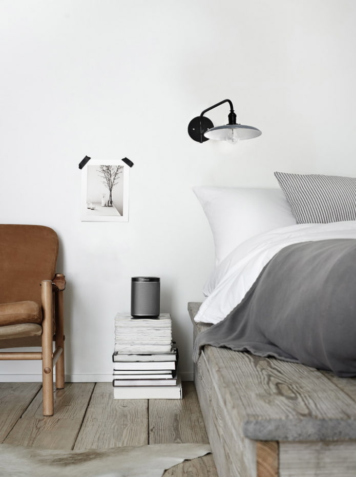 a stack of books as a bedside table a stack of books as a bedside table