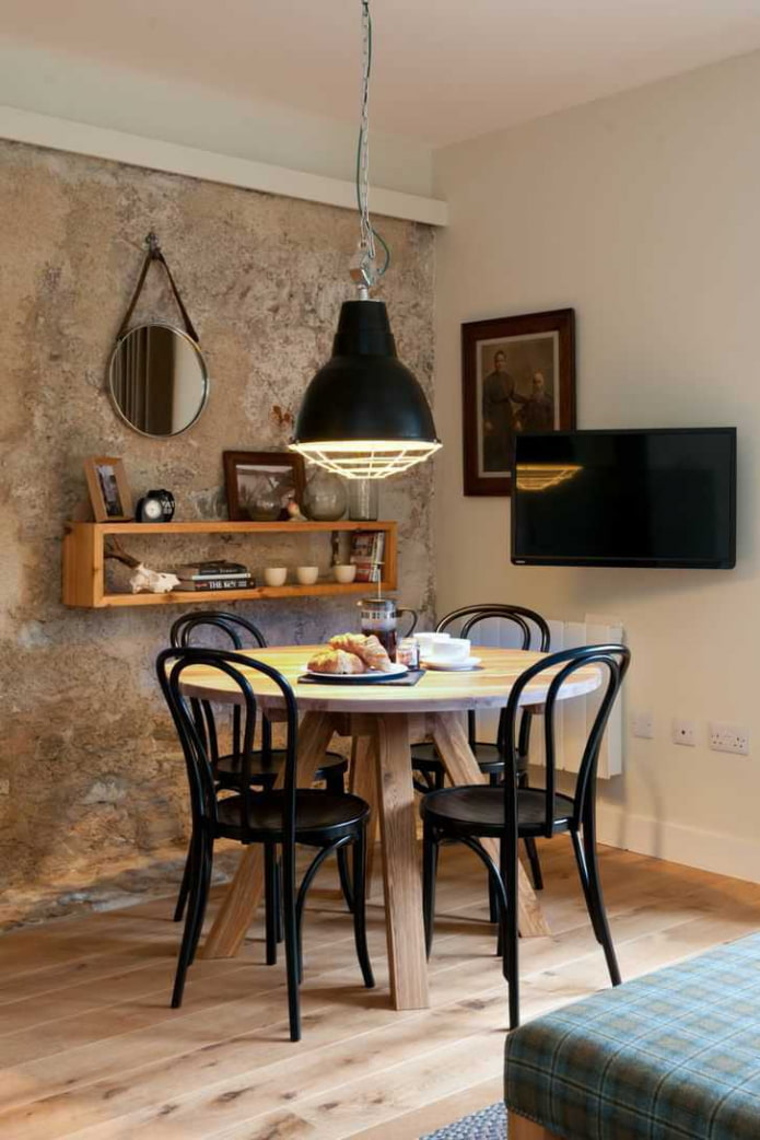 Table with chairs in the living room Table with chairs in the living room