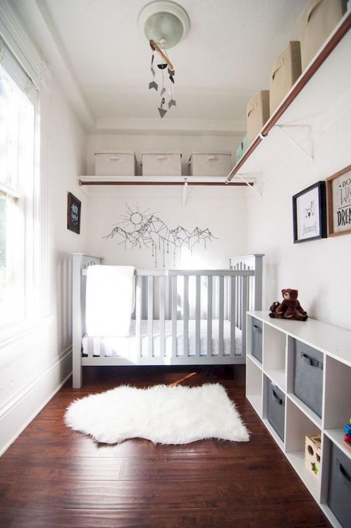 baby cot in a small room