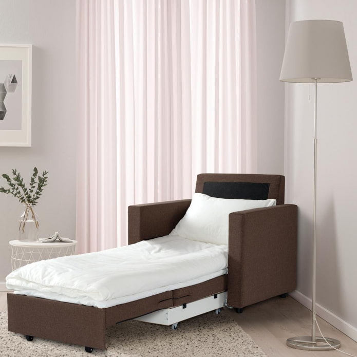 Armchair with folding seat Armchair with folding seat