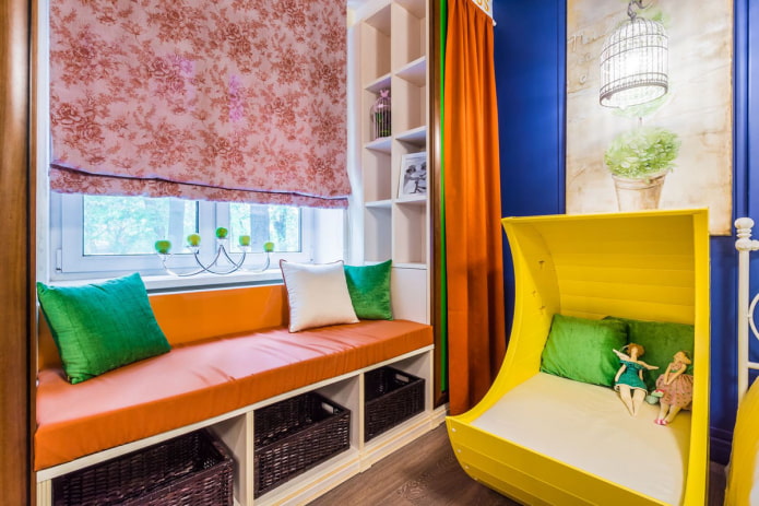 sofa with cushions on the window