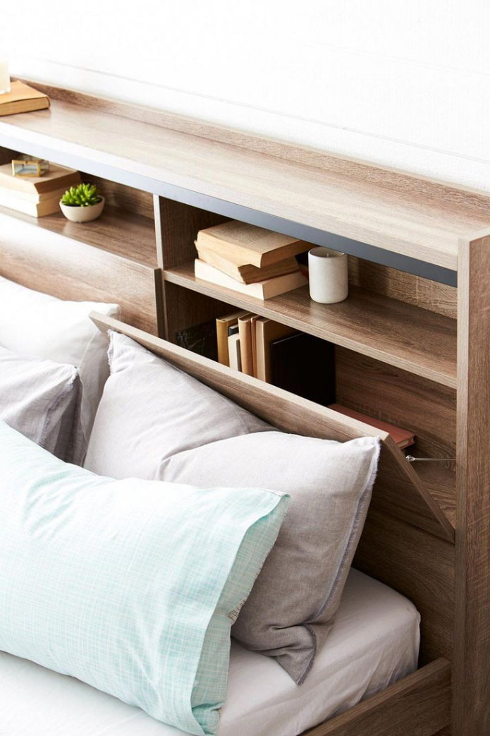 Hidden storage space in bed