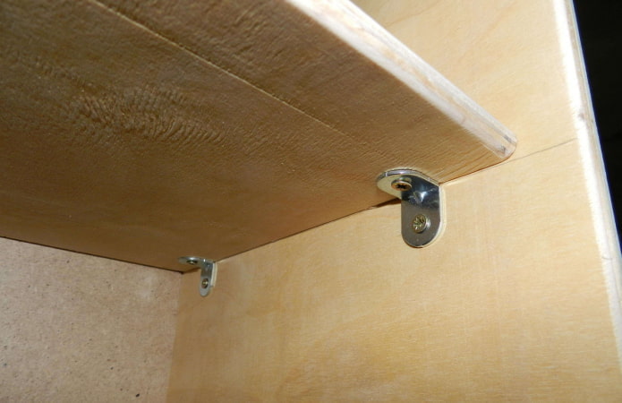 Shelf on holders Shelf on holders