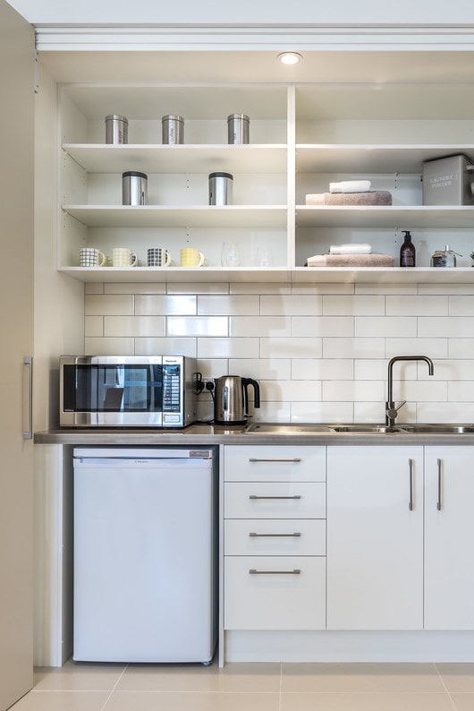 Refrigerator under the countertop Refrigerator under the countertop