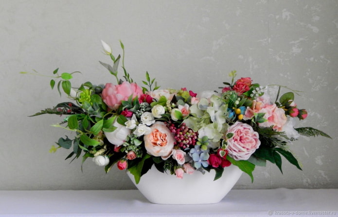 plastic flowers in a vase plastic flowers in a vase