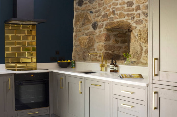 gold apron by the stove