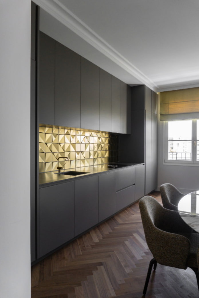 gold apron in black kitchen