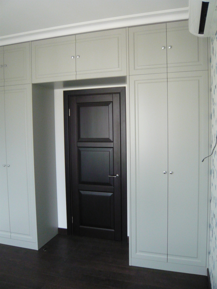 arch of wardrobes with mezzanine