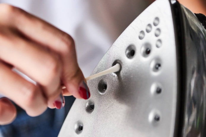 cleaning the soleplate of the iron cleaning the soleplate of the iron