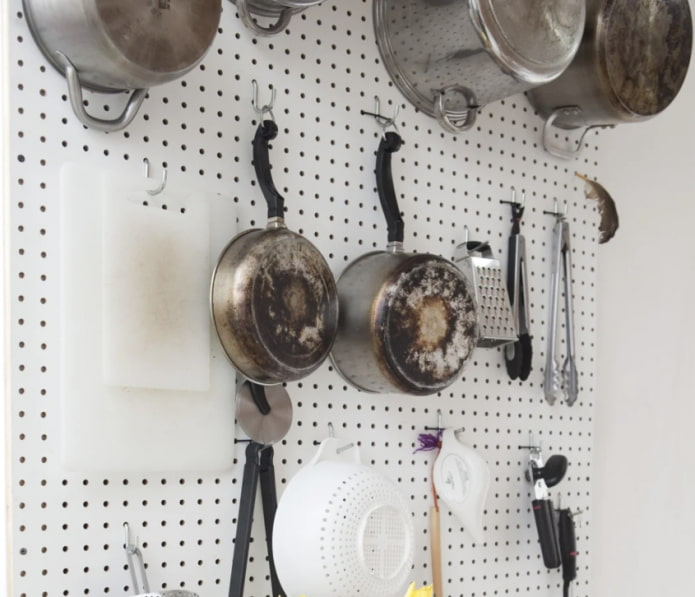 pans on a pegboard pans on a pegboard