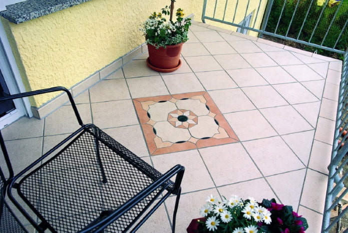 finishing the floor on the open balcony