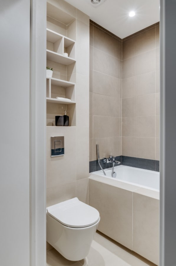 built-in shelves above the toilet