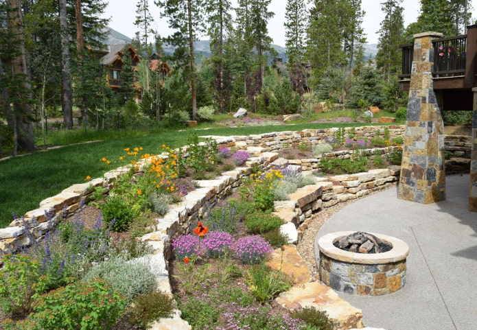 multi-tiered flower garden of flat stones