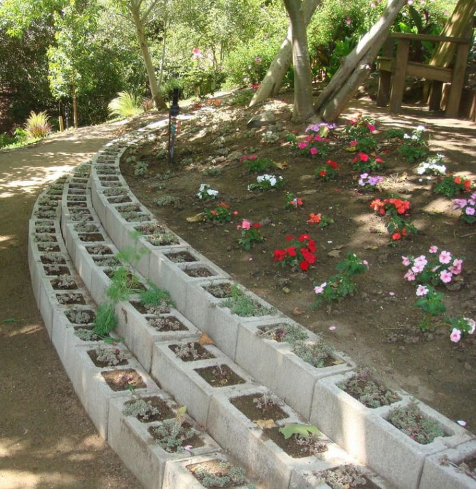 three-tiered border for a flower garden from rectangular blocks
