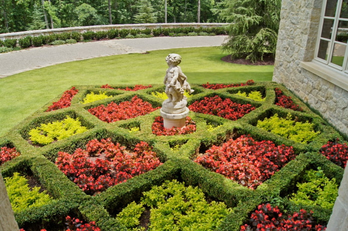 curly flower bed with a rectangular hedge