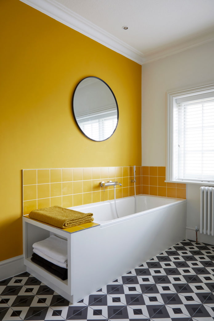 bathroom with yellow wall and black and white mosaic floor bathroom with yellow wall and black and white mosaic floor