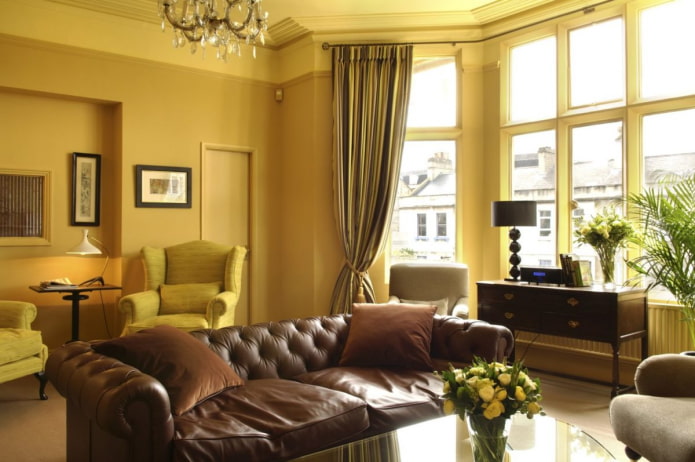 dark yellow living room with brown leather sofa dark yellow living room with brown leather sofa