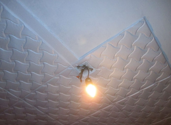 installation of tiles on the ceiling