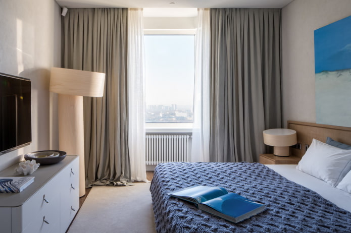 Gray curtains on a gray wall Gray curtains on a gray wall