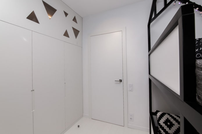 white door in a scandinavian interior white door in a scandinavian interior