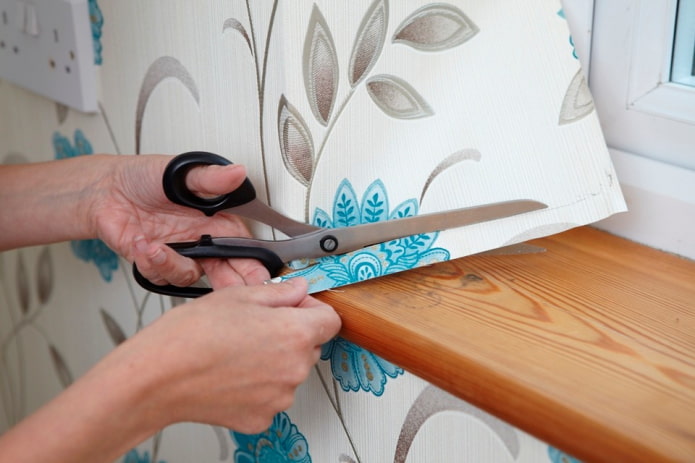gluing wallpaper around the window gluing wallpaper around the window