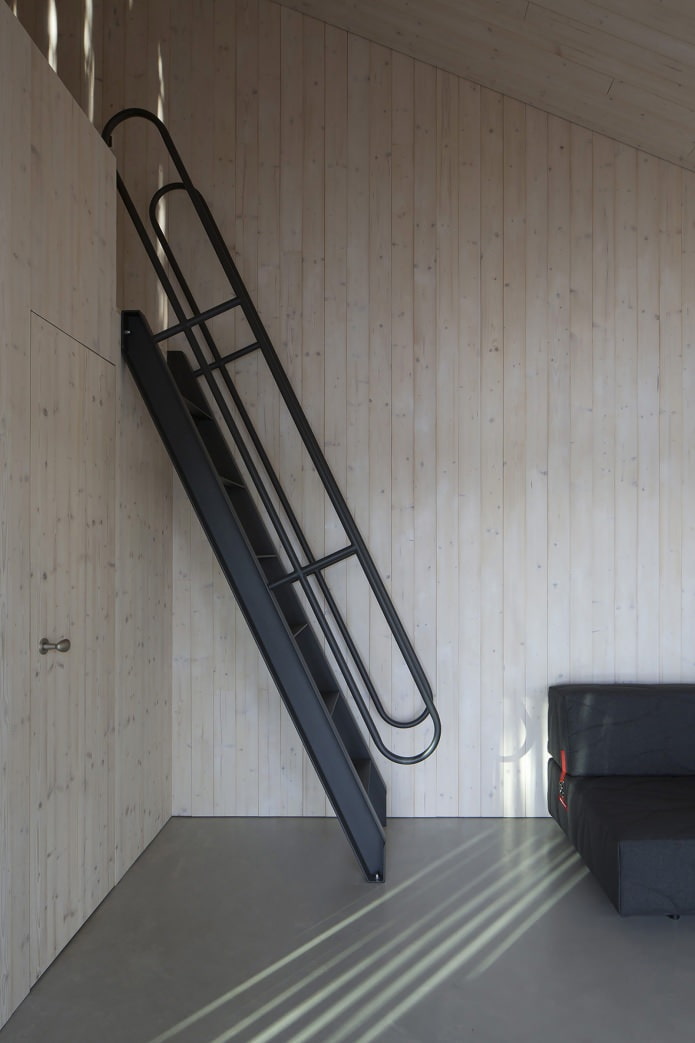 metal staircase to the bedroom on the second level