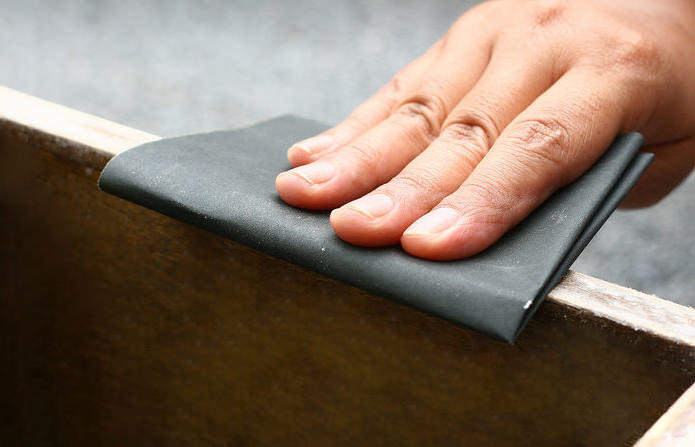 Sanding a wooden surface