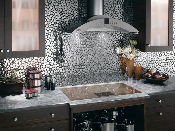 metal mosaic on the kitchen apron