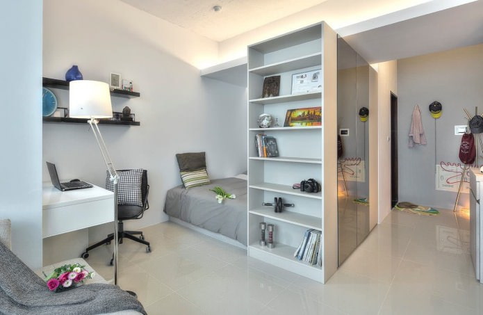 bedroom in the design of a studio apartment of 32 sq. m. bedroom in the design of a studio apartment of 32 sq. m.