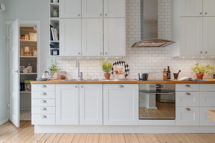 white brick in the interior of the kitchen