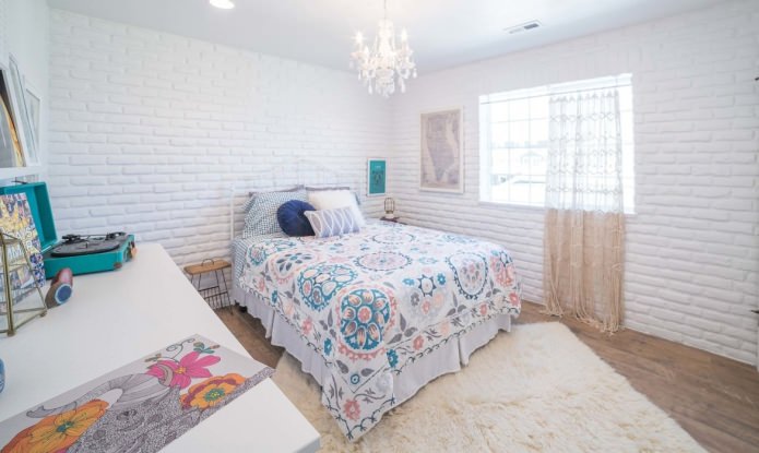 white brick wall in the bedroom