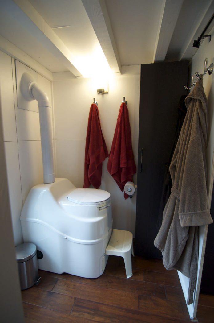 dry closet in a mobile home-wagon with a trailer dry closet in a mobile home-wagon with a trailer