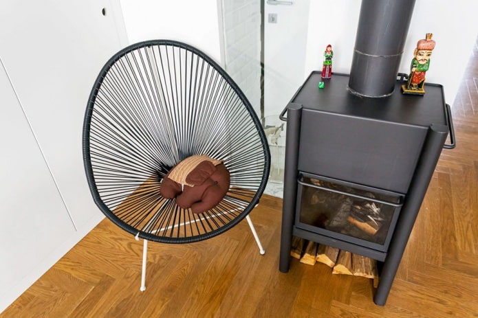 stove-potbelly stove in the interior of an apartment of 64 sq. m.