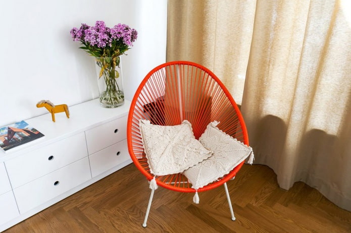 chair in the interior of the apartment 64 sq. m.