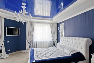 Stretch ceilings in the bedroom: 60 modern options, photo in the interior